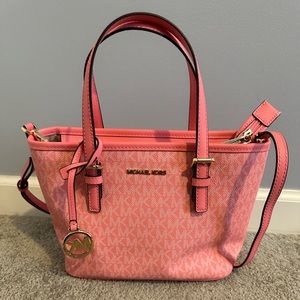 Michael Kors xs jet set travel tote in the color grapefruit